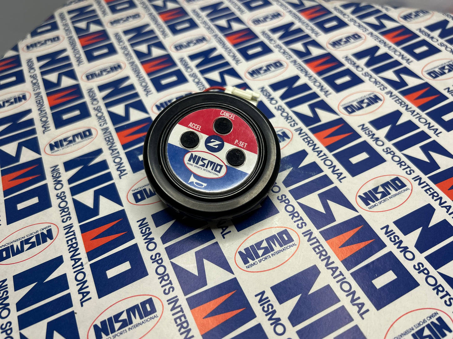 Vintage Nismo Old Logo Cruise Control Horn Button - Blue/Red