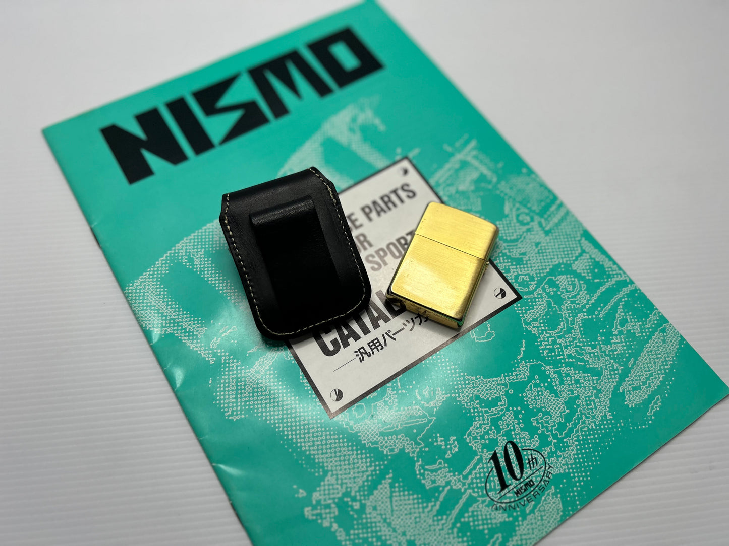 Vintage Nismo Old Logo Zippo with Leather Case