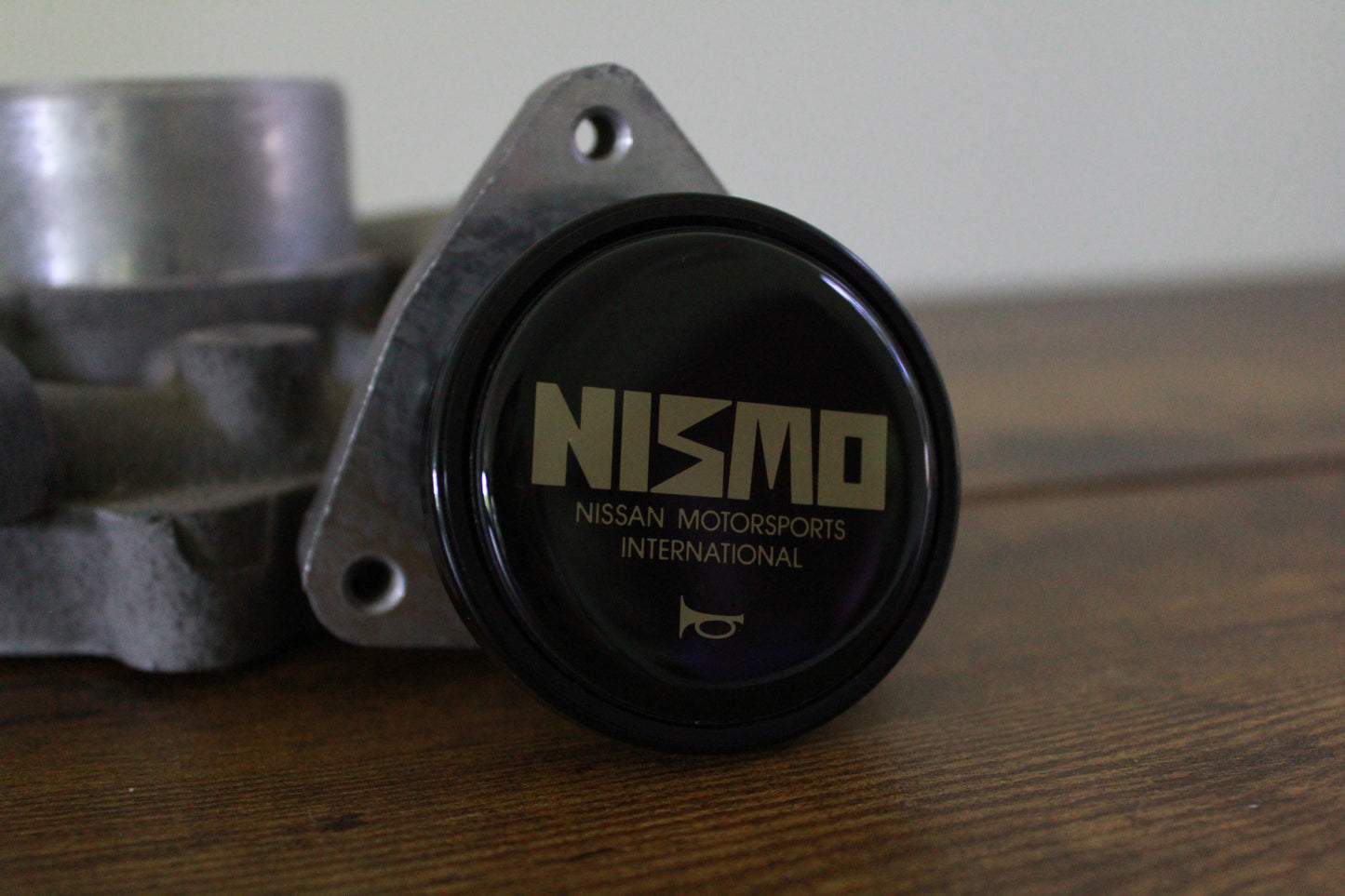 Genuine Nismo Old Logo Horn Button - Black