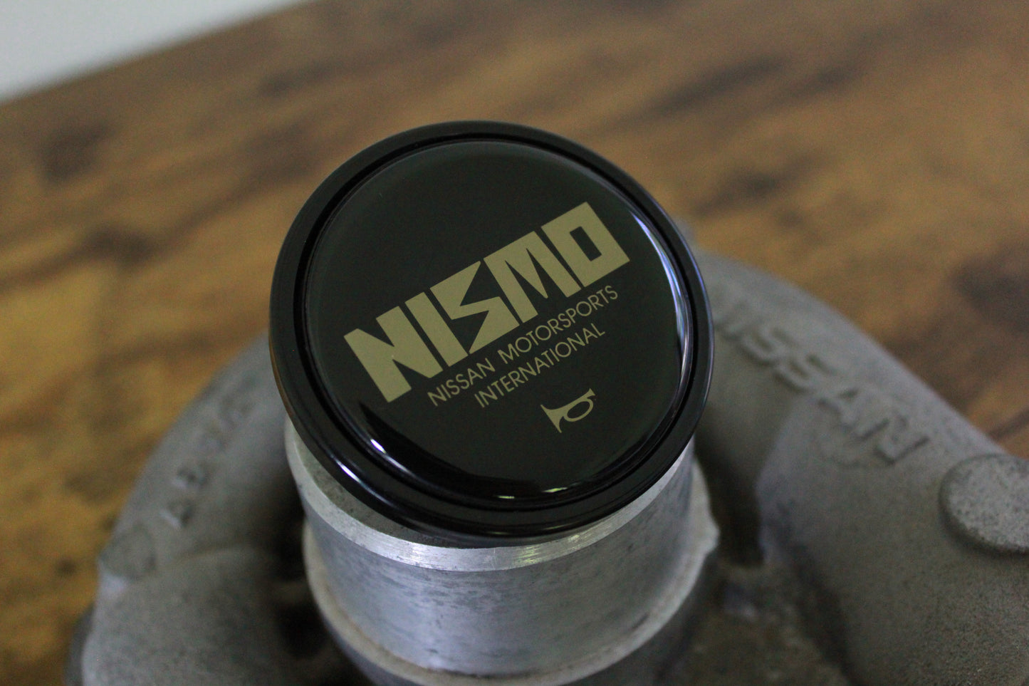 Genuine Nismo Old Logo Horn Button - Black