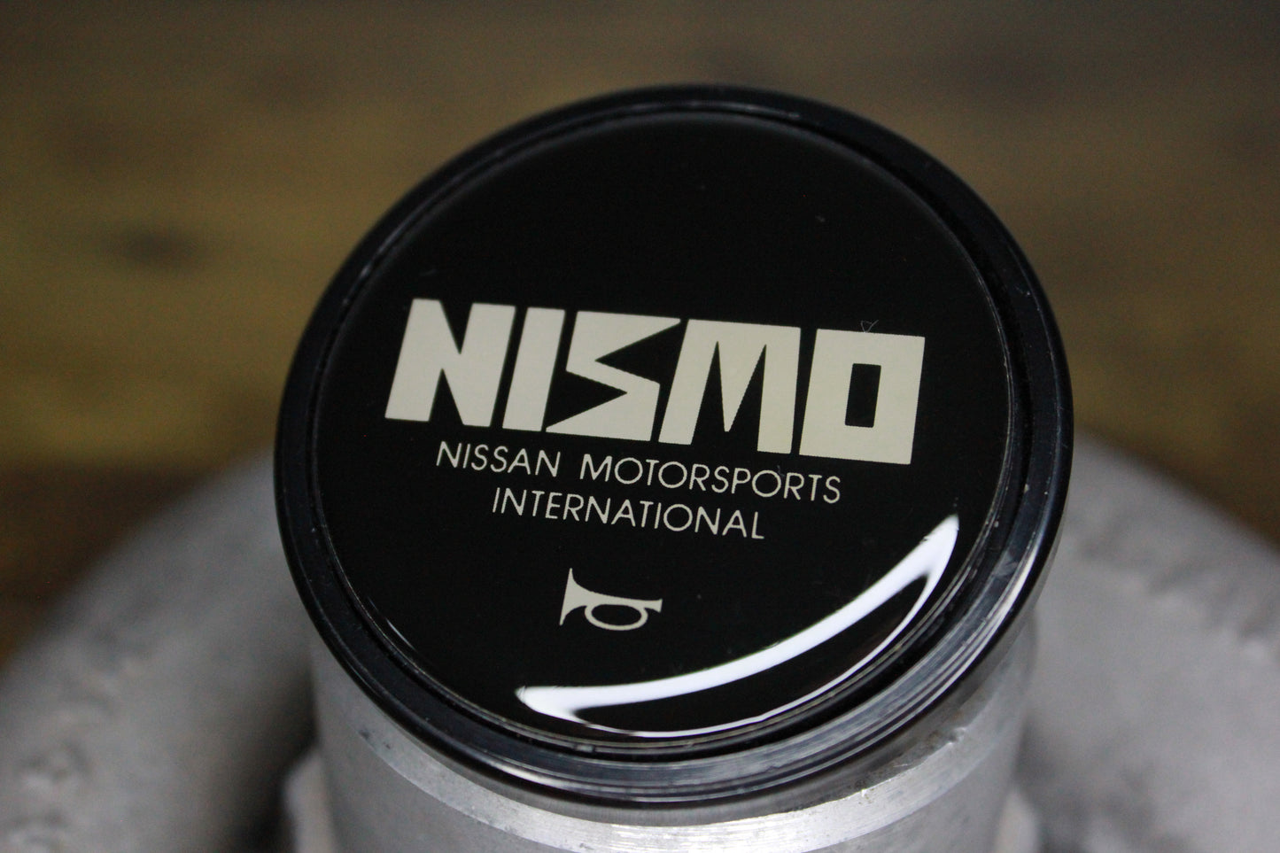 Genuine Nismo Old Logo Horn Button - Black