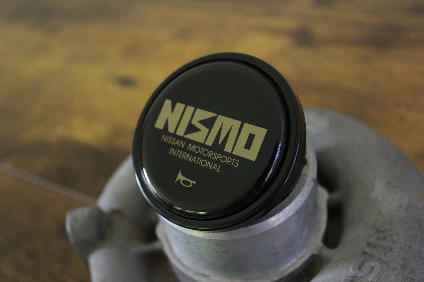 Genuine Nismo Old Logo Horn Button - Black
