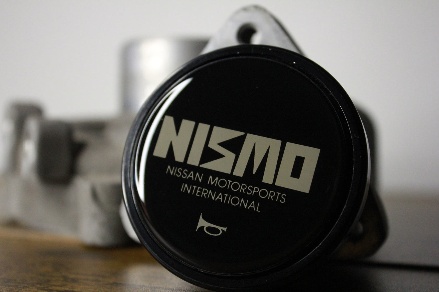 Genuine Nismo Old Logo Horn Button - Black