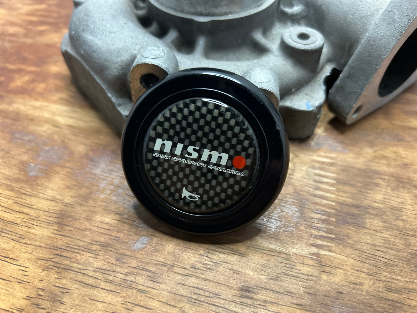 Genuine Nismo Mid Logo Horn Button - Carbon