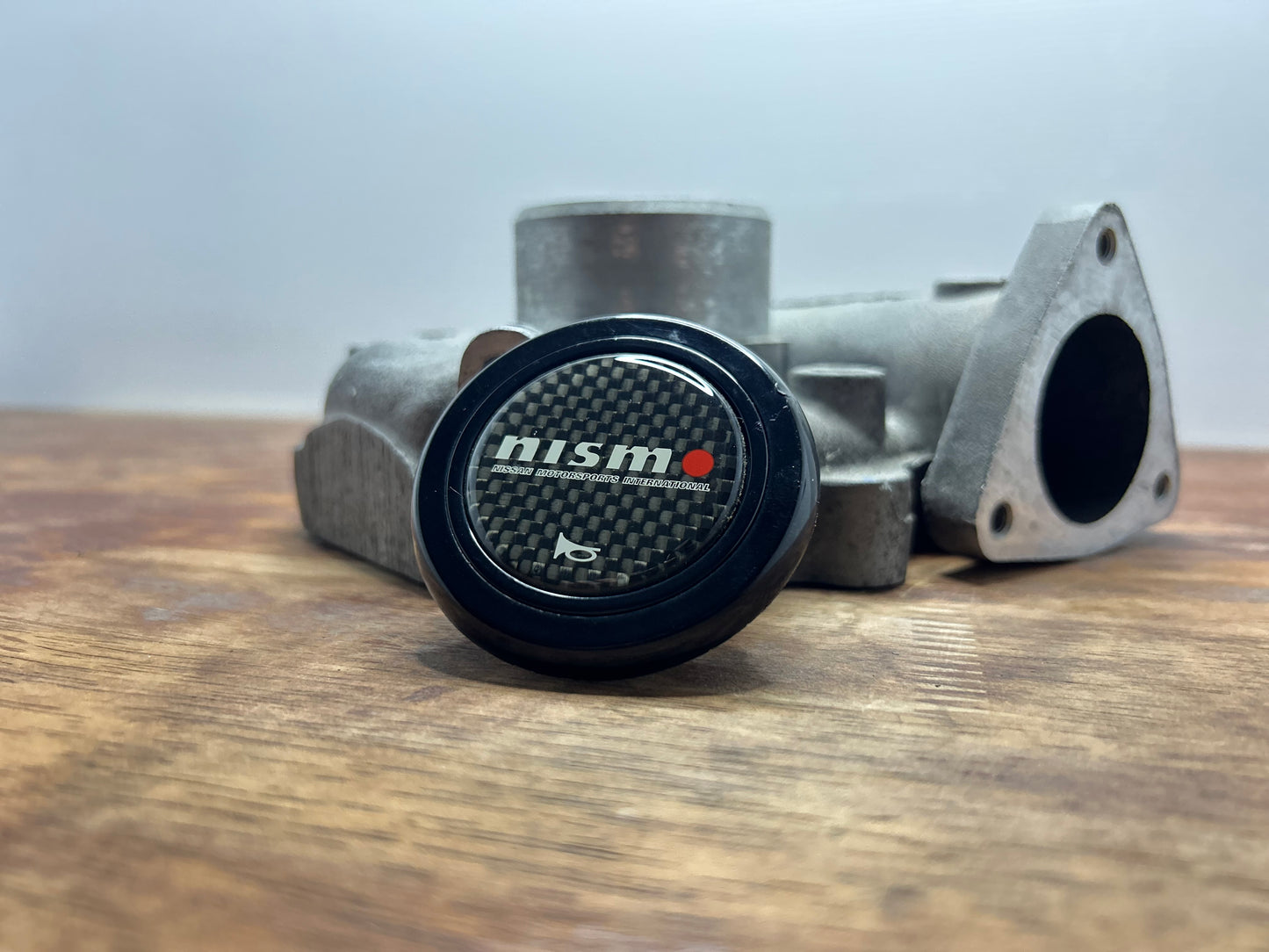 Genuine Nismo Mid Logo Horn Button - Carbon