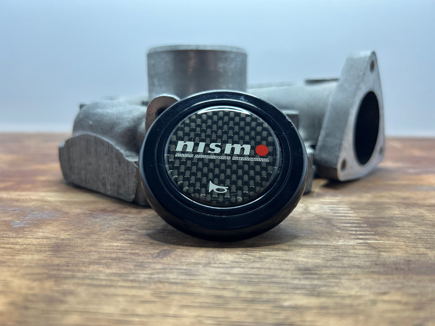 Genuine Nismo Mid Logo Horn Button - Carbon